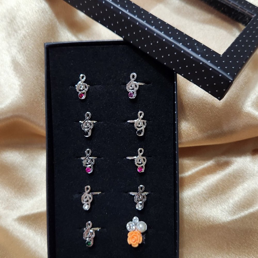 Starlet Shimmer mixed rings in box by Paparazzi